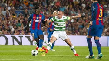 Umtiti, en una acción ante Scott Brown, capitán del Celtic.