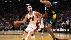 Dec 2, 2023; Miami, Florida, USA;  Miami Heat guard Jaime Jaquez Jr. (11) drives to the basket as Indiana Pacers forward Obi Toppin (1) defends during the second half at Kaseya Center. Mandatory Credit: Jim Rassol-USA TODAY Sports