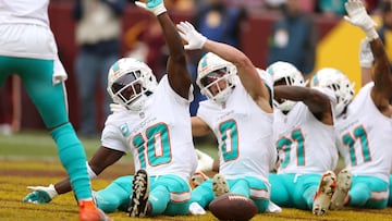 LANDOVER, MARYLAND - DECEMBER 03: Wide receiver Tyreek Hill #10 of the Miami Dolphins celebrates after catching a first half touchdown pass agains the Washington Commanders at FedExField on December 03, 2023 in Landover, Maryland.   Rob Carr/Getty Images/AFP (Photo by Rob Carr / GETTY IMAGES NORTH AMERICA / Getty Images via AFP)