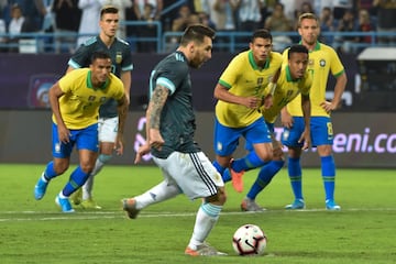 Messi strikes the Argentina penalty in the 14th minute of the game.