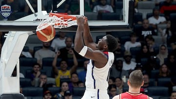 USA's Anthony Edwards dunks the ball during the Basketball Showcase friendly match between the USA and Germany at the Etihad Arena in Abu Dhabi on August 20, 2023. (Photo by Giuseppe CACACE / AFP)