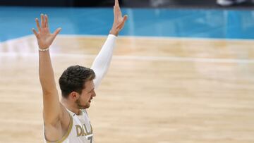 CHARLOTTE, NORTH CAROLINA - JANUARY 13: Luka Doncic #77 of the Dallas Mavericks reacts following a play during the first quarter of their game against the Charlotte Hornets at Spectrum Center on January 13, 2021 in Charlotte, North Carolina. NOTE TO USER: User expressly acknowledges and agrees that, by downloading and or using this photograph, User is consenting to the terms and conditions of the Getty Images License Agreement. Jared C. Tilton/Getty Images/AFP
== FOR NEWSPAPERS, INTERNET, TELCOS & TELEVISION USE ONLY ==