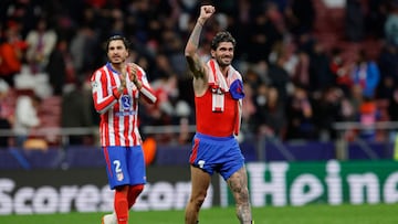 Atletico Madrid's Uruguayan defender #02 Jose Gimenez and Atletico Madrid's Argentine midfielder #05 Rodrigo De Paul celebrate their victory at the end of the UEFA Champions League, league phase football match between Club Atletico de Madrid and Bayer Leverkusen at the Metropolitano stadium in Madrid on January 21, 2025. (Photo by OSCAR DEL POZO / AFP)