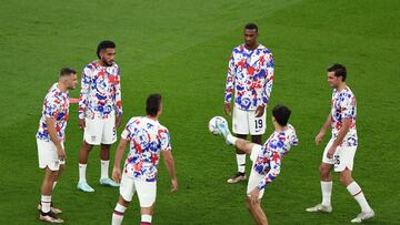 Soccer Football - FIFA World Cup Qatar 2022 - Group B - United States v Wales - Ahmad Bin Ali Stadium, Al Rayyan, Qatar - November 21, 2022 Joe Scally, Haji Wright and Jesus Ferreira of the U.S. during the warm up before the match REUTERS/Marko Djurica