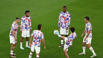 Soccer Football - FIFA World Cup Qatar 2022 - Group B - United States v Wales - Ahmad Bin Ali Stadium, Al Rayyan, Qatar - November 21, 2022  Joe Scally, Haji Wright and Jesus Ferreira of the U.S. during the warm up before the match REUTERS/Marko Djurica