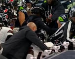 Jaxon Smith-Njigba heroically saved by referee from Texans fury