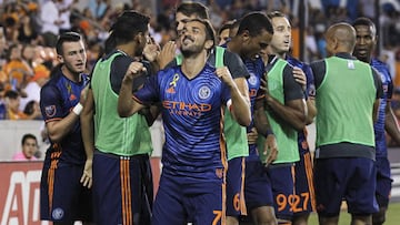 New York City FC forward David Villa (7) celebrates after scoring a goal during the second half against the Houston Dynamo at BBVA Compass Stadium.