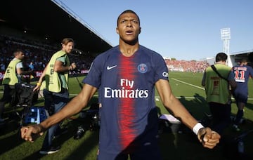 Kylian Mbappe of Paris Saint Germain celebrates after scoring a goal during the French Ligue 1 soccer match between Nimes Olympique and Paris Saint Germain, in Nimes, southern France, 01 September 2018.