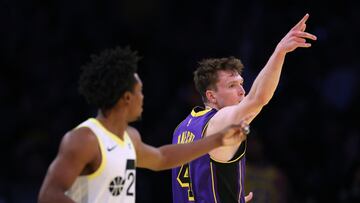 LOS ANGELES, CALIFORNIA - NOVEMBER 19: Dalton Knecht #4 of the Los Angeles Lakers celebrates a three pointer in front of Collin Sexton #2 of the Utah Jazz, Knecht would shoot nine three pointers and score 37 points, during a 124-118 Lakers win at Crypto.com Arena on November 19, 2024 in Los Angeles, California. Harry How/Getty Images/AFP NOTE TO USER: User expressly acknowledges and agrees that, by downloading and or using this photograph, User is consenting to the terms and conditions of the Getty Images License Agreement. (Photo by Harry How/Getty Images) (Photo by Harry How / GETTY IMAGES NORTH AMERICA / Getty Images via AFP)