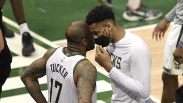 MILWAUKEE, WISCONSIN - JULY 01: Giannis Antetokounmpo #34 of the Milwaukee Bucks talks with P.J. Tucker #17 during a time out during the first half in Game Five of the Eastern Conference Finals against the Atlanta Hawksat Fiserv Forum on July 01, 2021 in Milwaukee, Wisconsin. NOTE TO USER: User expressly acknowledges and agrees that, by downloading and or using this photograph, User is consenting to the terms and conditions of the Getty Images License Agreement.   Patrick McDermott/Getty Images/AFP
 == FOR NEWSPAPERS, INTERNET, TELCOS &amp; TELEVISION USE ONLY ==