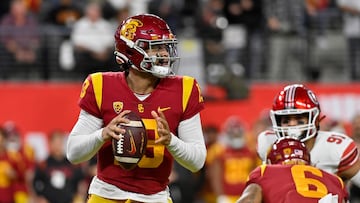 Caleb Williams #13 of the USC Trojans looks to pass against the Utah Utes during the first quarter in the Pac-12 Championship at Allegiant Stadium