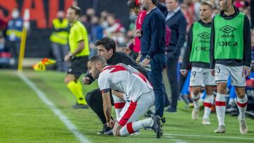 Iraola, con Mario Suárez.