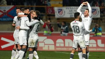 Cultural Leonesa&#039;s Julen Castaneda (R) celebrates with teamates after scoring a goal during the Copa del Rey (King&#039;s Cup) football match between Cultural Leonesa and Club Atletico de Madrid at the Reino de Leon stadium in Leon, on January 23, 20