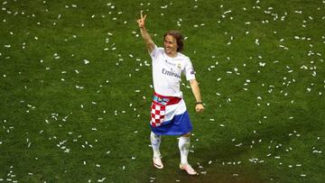 MILAN, ITALY - MAY 28: Luka Modric of Real Madrid celebrates after winning the UEFA Champions League Final match between Real Madrid and Club Atletico de Madrid at Stadio Giuseppe Meazza on May 28, 2016 in Milan, Italy. (Photo by Clive Mason/Getty Images)