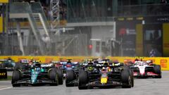 MONTREAL, QUEBEC - JUNE 18: Max Verstappen of the Netherlands driving the (1) Oracle Red Bull Racing RB19 leads Lewis Hamilton of Great Britain driving the (44) Mercedes AMG Petronas F1 Team W14 and the rest of the field at the start during the F1 Grand Prix of Canada at Circuit Gilles Villeneuve on June 18, 2023 in Montreal, Quebec.   Rudy Carezzevoli/Getty Images/AFP (Photo by Rudy Carezzevoli / GETTY IMAGES NORTH AMERICA / Getty Images via AFP)