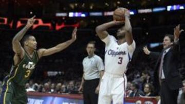 Chris Paul lanza ante Trey Burke.
