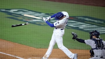 Oct 25, 2024; Los Angeles, California, USA; Los Angeles Dodgers first baseman Freddie Freeman (5) breaks his bat in the fourth inning against the New York Yankees during game one of the 2024 MLB World Series at Dodger Stadium. Mandatory Credit: Kiyoshi Mio-Imagn Images