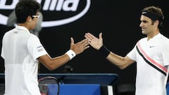 Tennis - Australian Open - Men&#039;s singles semifinals - Rod Laver Arena, Melbourne, Australia, January 26, 2018. Chung Hyeon of South Korea shakes hands with  Roger Federer of Switzerland after Chung retired from their match. REUTERS/Thomas Peter