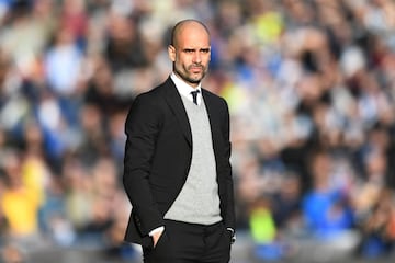 Josep Guardiola of Manchester City looks on during the the Emirates FA Cup Fifth Round match between Huddersfield Town and Manchester City at John Smith's Stadium on February 18, 2017 in Huddersfield, England. 