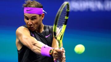 NEW YORK, NEW YORK - AUGUST 27: Rafael Nadal of Spain returns a shot against John Millman of Australia during their Men&#039;s Singles first round match on day two of the 2019 US Open at the USTA Billie Jean King National Tennis Center on August 27, 2019 in the Flushing neighborhood of the Queens borough of New York City.   Clive Brunskill/Getty Images/AFP
 == FOR NEWSPAPERS, INTERNET, TELCOS &amp; TELEVISION USE ONLY ==
