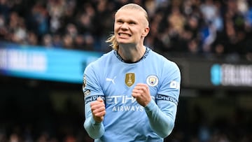 Manchester City's Norwegian striker #09 Erling Haaland celebrates after scoring his team first goal during the English Premier League football match between Manchester City and Brighton and Hove Albion at the Etihad Stadium in Manchester, north west England, on March 15, 2025. (Photo by Oli SCARFF / AFP) / RESTRICTED TO EDITORIAL USE. No use with unauthorized audio, video, data, fixture lists, club/league logos or 'live' services. Online in-match use limited to 120 images. An additional 40 images may be used in extra time. No video emulation. Social media in-match use limited to 120 images. An additional 40 images may be used in extra time. No use in betting publications, games or single club/league/player publications. /