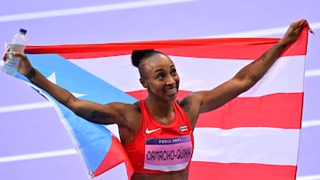 Bronze medallist Puerto Rico's Jasmine Camacho-Quinn celebrates after the women's 100m hurdles final of the athletics event at the Paris 2024 Olympic Games at Stade de France in Saint-Denis, north of Paris, on August 10, 2024. (Photo by Martin BERNETTI / AFP)
