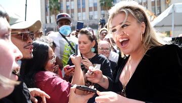 Singer Kelly Clarkson talks to fans at the unveiling of her star on the Hollywood Walk of Fame in Los Angeles, California, U.S. September 19, 2022. REUTERS/Mario Anzuoni