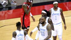 Jan 10, 2021; Houston, Texas, USA; LeBron James #23 of the Los Angeles Lakers and teammates react during the fourth quarter of a game against the Houston Rockets at Toyota Center on January 10, 2021 in Houston, Texas.   Mandatory Credit: Carmen Mandato/Pool Photo-USA TODAY Sports