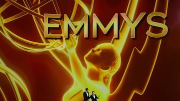 (FILES) In this file photo taken on September 22, 2019, Actors Ken Jeong (R) and Nick Cannon (L) speak onstage during the 71st Emmy Awards at the Microsoft Theatre in Los Angeles. - No red carpet, no star-studded audience and no "Game of Thrones"