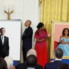 Michelle and Barack Obama return to the White House for the unveiling of their official portraits
