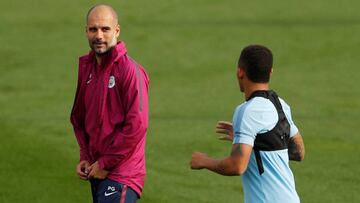 Soccer Football - Manchester City Training - City Football Academy, Manchester, Britain - September 25, 2017 Manchester City's Gabriel Jesus with manager Pep Guardiola during training Action Images via Reuters/Lee Smith