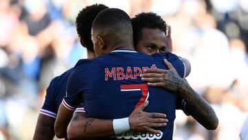 Paris Saint-Germain's Brazilian forward Neymar is congratuled by Paris Saint-Germain's French forward Kylian Mbappe after scoring a goal during the friendly football match between Paris Saint-Germain (PSG) and Glasgow Celtic FC at the Parc des P