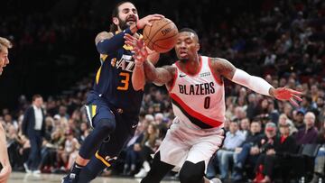 Ricky Rubio, ante Damian Lillard.