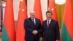 Belarusian President Alexander Lukashenko shakes hands with Chinese President Xi Jinping during a meeting in Beijing, China, March 1, 2023. BelTA/Pavel Orlovsky/Handout via REUTERS ATTENTION EDITORS - THIS IMAGE WAS PROVIDED BY A THIRD PARTY. NO RESALES. NO ARCHIVES. MANDATORY CREDIT.