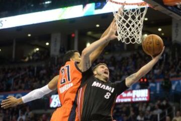 Andre Roberson y Tyler Johnson.