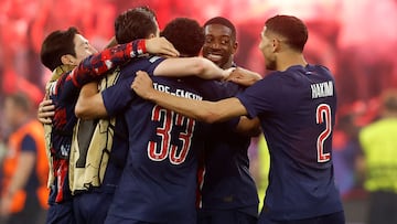 Paris Saint-Germain's players celebrate at the end of the UEFA Champions League final football match between Paris Saint-Germain (PSG) and Inter Milan in Munich, southern Germany, on May 31, 2025. Paris Saint-Germain won the Champions League for the first time by thrashing Inter Milan 5-0 in the most one-sided final in the competition's history. (Photo by Odd ANDERSEN / AFP)