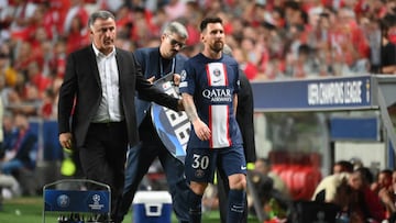 Paris Saint-Germain's French head coach Christophe Galtier (L) walks with Paris Saint-Germain's Argentine forward Lionel Messi as he leaves the pitch during the UEFA Champions League 1st round day 3 group H football match between SL Benfica and Paris Saint-Germain, at the Luz stadium in Lisbon on October 5, 2022. (Photo by FRANCK FIFE / AFP) (Photo by FRANCK FIFE/AFP via Getty Images)