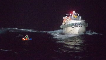 Amami Oshima (Japan), 03/09/2020.- A handout photo made available by the Japan Coast Guard (JCG) 10th Coast Guard Headquarters shows Japan Coast Guard officers rescuing a Filipino crew member of the Gulf Livestock 1 cargo vessel, after it sank during Typh