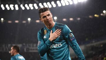 (FILES) In this file photo taken on April 03, 2018 Real Madrid&#039;s Portuguese forward Cristiano Ronaldo celebrates his second goal during the UEFA Champions League quarter-final first leg football match between Juventus and Real Madrid at the Allianz S