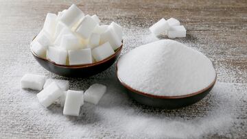 FILE PHOTO: Granulated white sugar and sugar cubes are seen in this picture illustration taken December 16, 2018. REUTERS/Emmanuel Foudrot/Illustration/File Photo