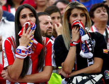 Atletico Madrid fans react during the last match at Vicente Calderon as Atletico Madrid bids farewell to its home of 51 years before moving to the newly-built Wanda Metropolitano.