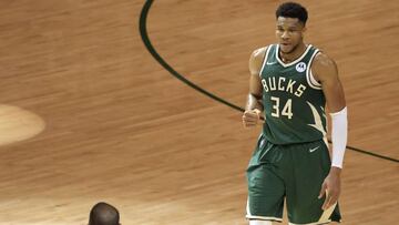 MILWAUKEE, WISCONSIN - JULY 11: Giannis Antetokounmpo #34 of the Milwaukee Bucks celebrates during the second half in Game Three of the NBA Finals against the Phoenix Suns at Fiserv Forum on July 11, 2021 in Milwaukee, Wisconsin. NOTE TO USER: User expres