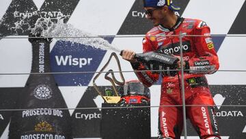 Ducati Lenovo's Italian rider Francesco Bagnaia celebrates on the podium after winning the MotoGP Austrian Grand Prix at the Redbull Ring racetrack in Spielberg on August 21, 2022. (Photo by VLADIMIR SIMICEK / AFP) (Photo by VLADIMIR SIMICEK/AFP via Getty Images)