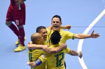 Brazil's Falcao celebrates with teammates after scoring against Iran.