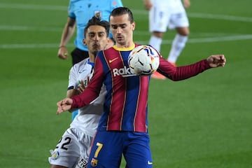 Antoine Griezmann y Damián Suárez.