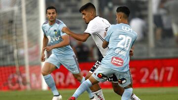 Futbol, Colo Colo vs O'Higgins.
Cuarta fecha, campeonato nacional 2018
El jugador de Colo Colo Nicolas Orellana, izquierda , juega el balón contra O'Higgins durante el partido de primera division en el estadio Monumental.
Santiag