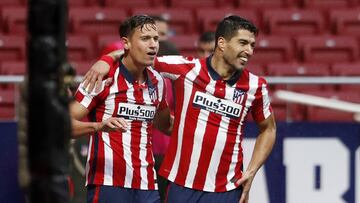 Marcos Llorente y Luis Suárez, del Atlético de Madrid.