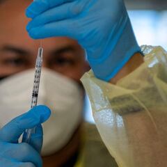 Will wearing a face mask be mandatory after the vaccine?