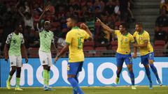 Singapore (Singapore), 13/10/2019.- Casemiro (2-R) of Brazil celebrates after scoring during an international friendly match between Brazil and Nigeria at the National Stadium in Singapore, 13 October 2019. (Futbol, Amistoso, Brasil, Singapur, Singapur) E