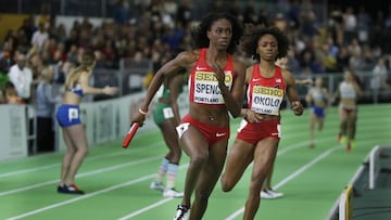 United States relay runners Ashley Spencer, left, and Courtney Okolo. 